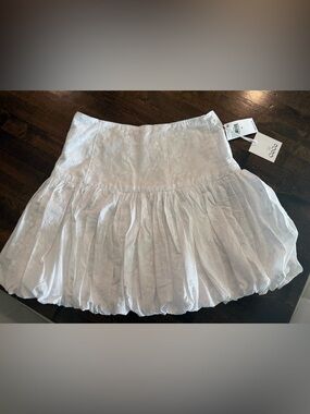CeCe White Eyelet Tiered Mini Skirt with flower design, 100% cotton